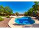 Relaxing pool and patio area with outdoor kitchen at 16205 S 7Th St, Phoenix, AZ 85048