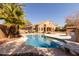 Relaxing pool area with diving board and palm trees at 16205 S 7Th St, Phoenix, AZ 85048