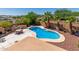 Inviting backyard pool with built-in BBQ area at 16205 S 7Th St, Phoenix, AZ 85048