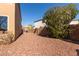 Side yard with gravel and some shrubs at 16205 S 7Th St, Phoenix, AZ 85048