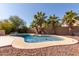 Inviting kidney-shaped pool in the backyard at 16205 S 7Th St, Phoenix, AZ 85048