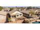 Aerial view of home and pool in a community at 169 E Canary Ct, San Tan Valley, AZ 85143