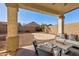 Private backyard with a covered patio, perfect for outdoor entertaining at 169 E Canary Ct, San Tan Valley, AZ 85143