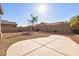 Landscaped backyard with paved patio and gravel area at 169 E Canary Ct, San Tan Valley, AZ 85143