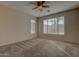 Spacious bedroom with carpet flooring and ceiling fan at 169 E Canary Ct, San Tan Valley, AZ 85143