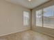 Bright dining area with tile flooring and large windows at 169 E Canary Ct, San Tan Valley, AZ 85143