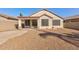 Single story home with a covered patio and gravel yard at 169 E Canary Ct, San Tan Valley, AZ 85143