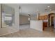 Kitchen features a breakfast bar and views into the living room at 169 E Canary Ct, San Tan Valley, AZ 85143