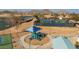 playground with shade structure near tennis and pickleball courts at 169 E Canary Ct, San Tan Valley, AZ 85143