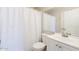 Bathroom with white vanity and shower/tub combo at 170 E Guadalupe Rd # 174, Gilbert, AZ 85234