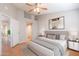 Main bedroom with wood floors and ceiling fan at 170 E Guadalupe Rd # 174, Gilbert, AZ 85234