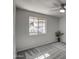 Bright bedroom with carpet, large window, and ceiling fan at 1720 E Thunderbird Rd # 2010, Phoenix, AZ 85022