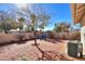 Small backyard with patio and two blue chairs at 1745 N Terrace Cir, Casa Grande, AZ 85122