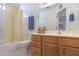 Clean bathroom with double vanity and shower/tub combo at 1745 N Terrace Cir, Casa Grande, AZ 85122