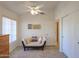 Cozy bedroom with a comfy daybed and ceiling fan at 1745 N Terrace Cir, Casa Grande, AZ 85122