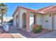 Arched entryway and walkway to a single-story home at 1745 N Terrace Cir, Casa Grande, AZ 85122