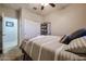 Bedroom with a double bed and built-in shelving at 17563 W Fairview St, Goodyear, AZ 85338