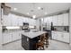 Spacious kitchen with island, stainless steel appliances, and granite countertops at 17563 W Fairview St, Goodyear, AZ 85338