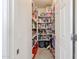 Well-organized pantry with ample shelving for food storage at 17563 W Fairview St, Goodyear, AZ 85338