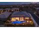 Luxury home at night with private pool and patio at 17904 E Veit Springs Dr, Rio Verde, AZ 85263