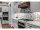 Modern kitchen with stainless steel appliances and white cabinets at 17904 E Veit Springs Dr, Rio Verde, AZ 85263