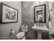 Elegant powder room with hexagon tile and modern vanity at 17904 E Veit Springs Dr, Rio Verde, AZ 85263