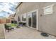 Patio area with artificial turf and sitting area at 17909 N 114Th Dr, Surprise, AZ 85378