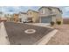 Row of townhouses with attached garages and paved street at 17909 N 114Th Dr, Surprise, AZ 85378