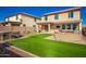 Spacious backyard with hot tub and outdoor kitchen at 18475 W Via Del Sol --, Surprise, AZ 85387