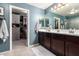 Luxurious bathroom with double sinks, a soaking tub, and a walk-in shower at 18475 W Via Del Sol --, Surprise, AZ 85387