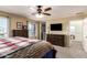 Spacious bedroom with a large TV and plenty of natural light at 18475 W Via Del Sol --, Surprise, AZ 85387