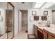 Bathroom with double vanity and shower at 19633 N Marble Dr, Sun City West, AZ 85375