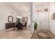 Formal dining room with a round table and six black chairs at 19633 N Marble Dr, Sun City West, AZ 85375