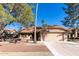 Single-story home with a two-car garage and desert landscaping at 19633 N Marble Dr, Sun City West, AZ 85375