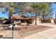 Single-story home with a two-car garage and desert landscaping at 19633 N Marble Dr, Sun City West, AZ 85375