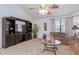 Living room with a large TV stand and comfortable seating at 19633 N Marble Dr, Sun City West, AZ 85375