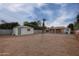 Large backyard with detached garage and gravel landscaping at 2112 W Mulberry Dr, Phoenix, AZ 85015