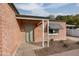 Front entrance with a green door and brick facade at 2112 W Mulberry Dr, Phoenix, AZ 85015