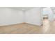 This room has hardwood floors, neutral paint, and a door leading to the backyard at 2316 W Moody Trl, Phoenix, AZ 85041