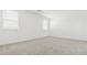 Bright and airy bedroom features neutral carpet and ample natural light at 2316 W Moody Trl, Phoenix, AZ 85041