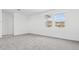 Bright bedroom with two windows offering a mountain view and neutral carpet at 2316 W Moody Trl, Phoenix, AZ 85041