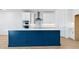 Close up of kitchen island featuring a blue finish and white countertops at 2316 W Moody Trl, Phoenix, AZ 85041