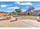 Spacious backyard, featuring a firepit and grassy area at 2327 W Branham Ln, Phoenix, AZ 85041