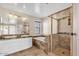 Bathroom boasts double sinks, a soaking tub, and a shower at 2327 W Branham Ln, Phoenix, AZ 85041