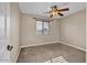 Bright bedroom with ceiling fan and mirrored closet at 2327 W Branham Ln, Phoenix, AZ 85041