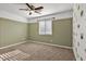 Charming bedroom with wainscoting and ceiling fan at 2327 W Branham Ln, Phoenix, AZ 85041