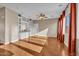 Bright living room featuring hardwood floors and built-in shelving at 2327 W Branham Ln, Phoenix, AZ 85041