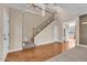 Elegant staircase with wrought iron railings leading to the second floor at 2327 W Branham Ln, Phoenix, AZ 85041