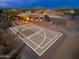 Private outdoor basketball court next to the house at 23414 N 84Th Pl, Scottsdale, AZ 85255