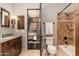 Bathroom with tub, shower, and view into bedroom at 23414 N 84Th Pl, Scottsdale, AZ 85255